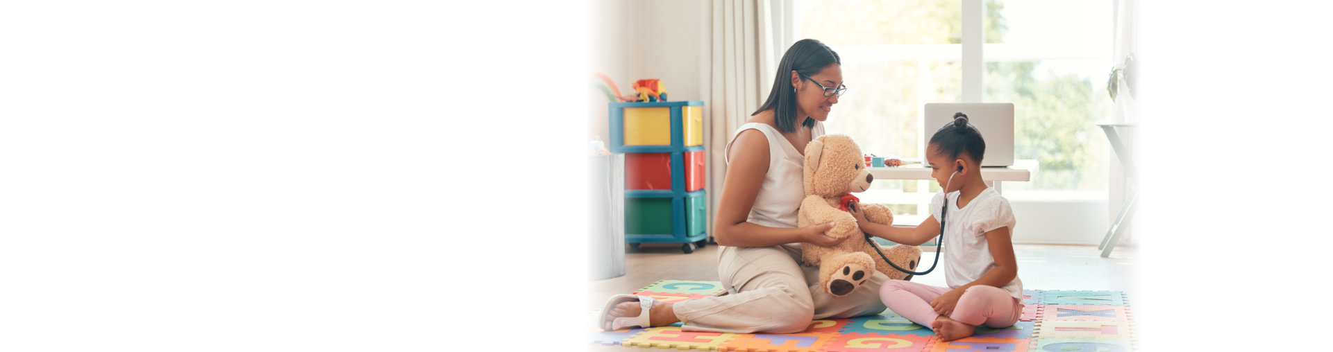 Kindergarten, education and stethoscope with teacher and girl playing doctor game with teddy bear for development, learning and care. Classroom, wellness and therapist with young student and woman
